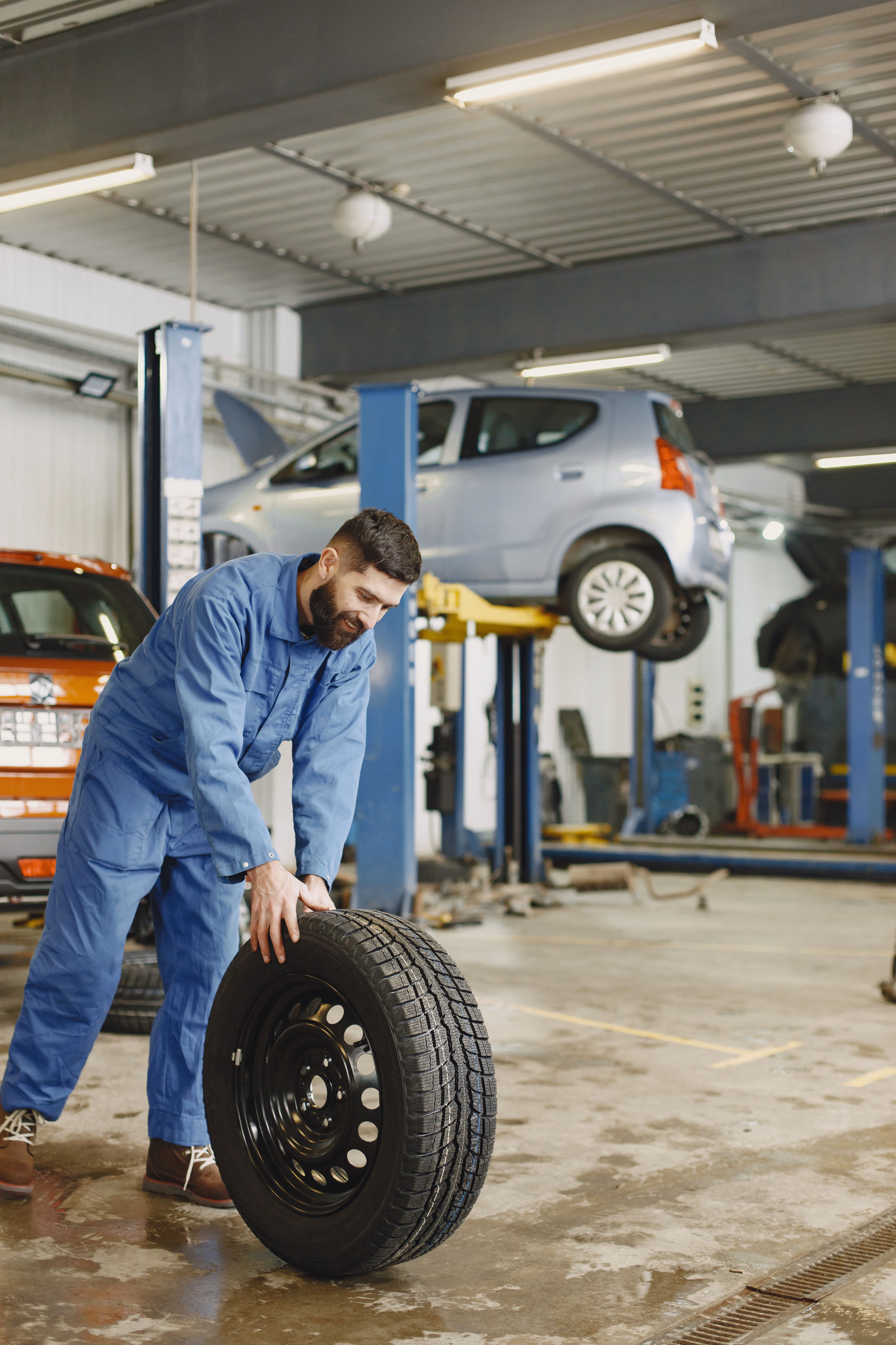 Technician performing professional tire installation